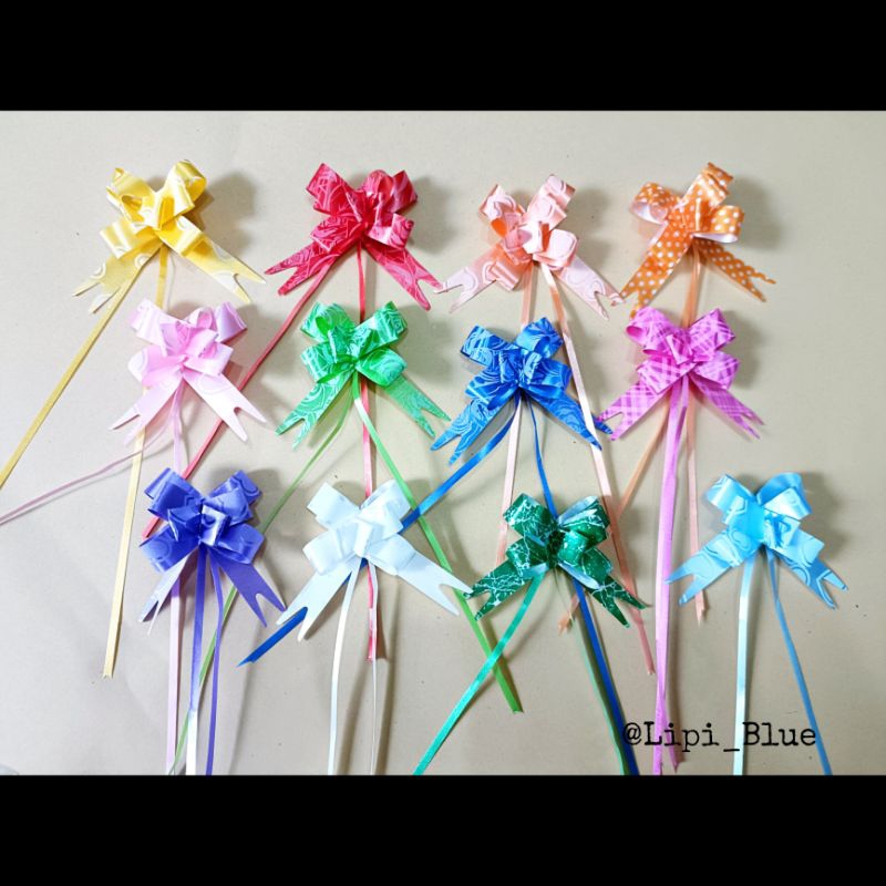 

(isi 10 pcs) Pita Serut Mini| Hiasan Hampers Parcel Kado Gift Pull Ribbon Pita Tarik