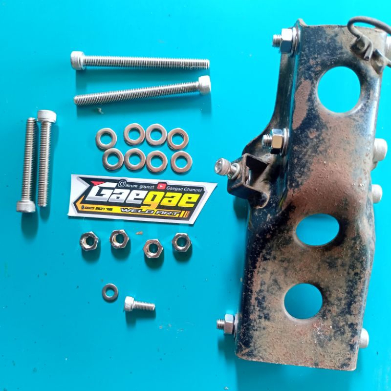 baut L stainless pangkon mesin depan tiger