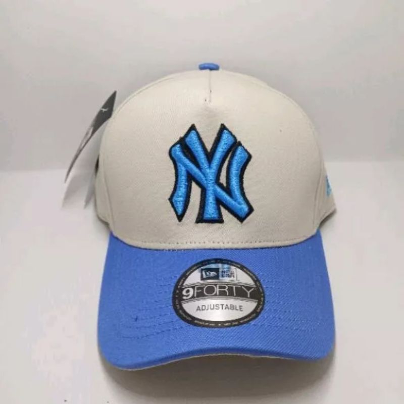 TOPI logo NY_LA list hitam cream biru
