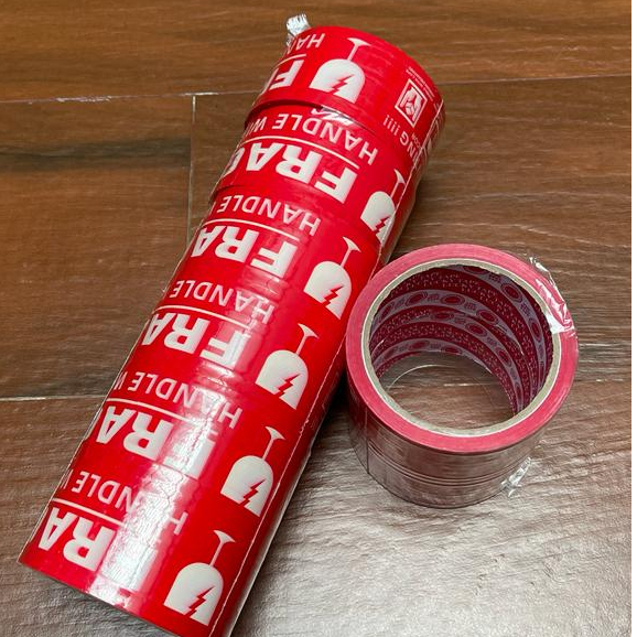 

Lakban Lucky Tape 2inch bening coklat fragile - FRAGILE