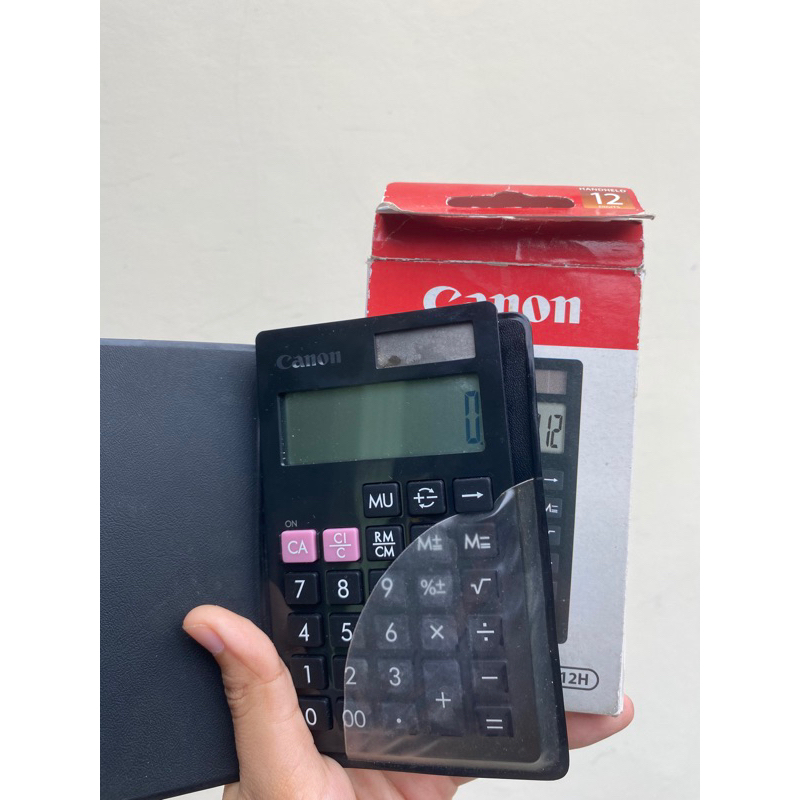 

Canon Calculator LS-12H Tenaga Baterai dan Surya