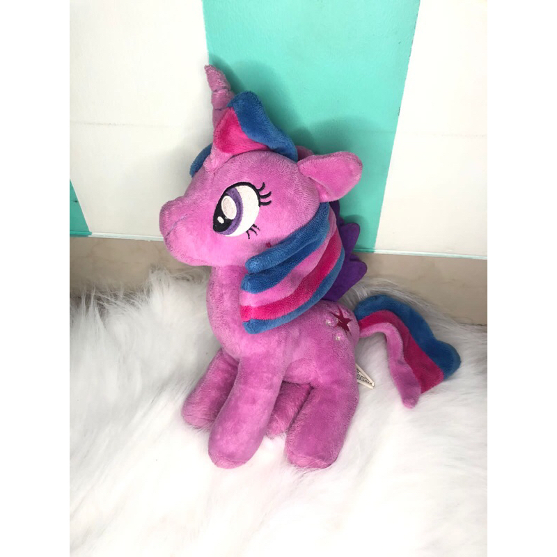 preloved boneka unicorn ungu pelangi