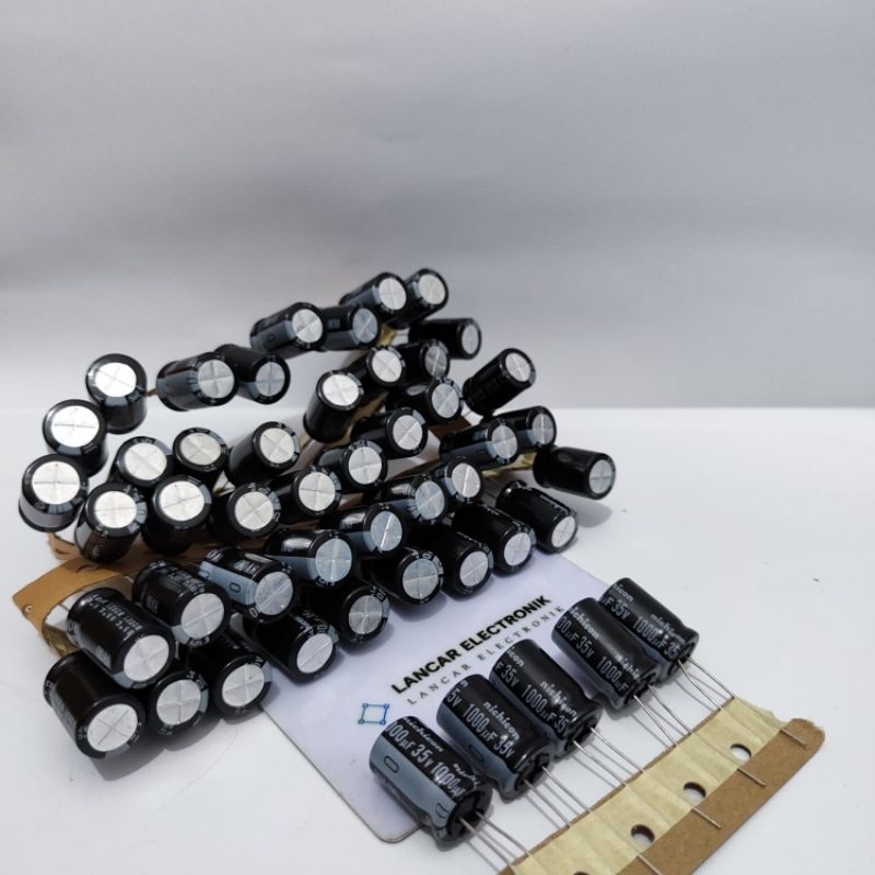 Elco 1000uf 35v / Elko 1000uf 35v  Merek Nichicon Original Hitam Roll / Renceng