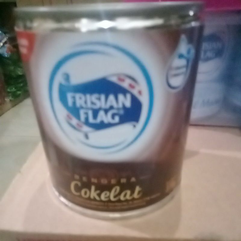 

susu kaleng Frisian flag