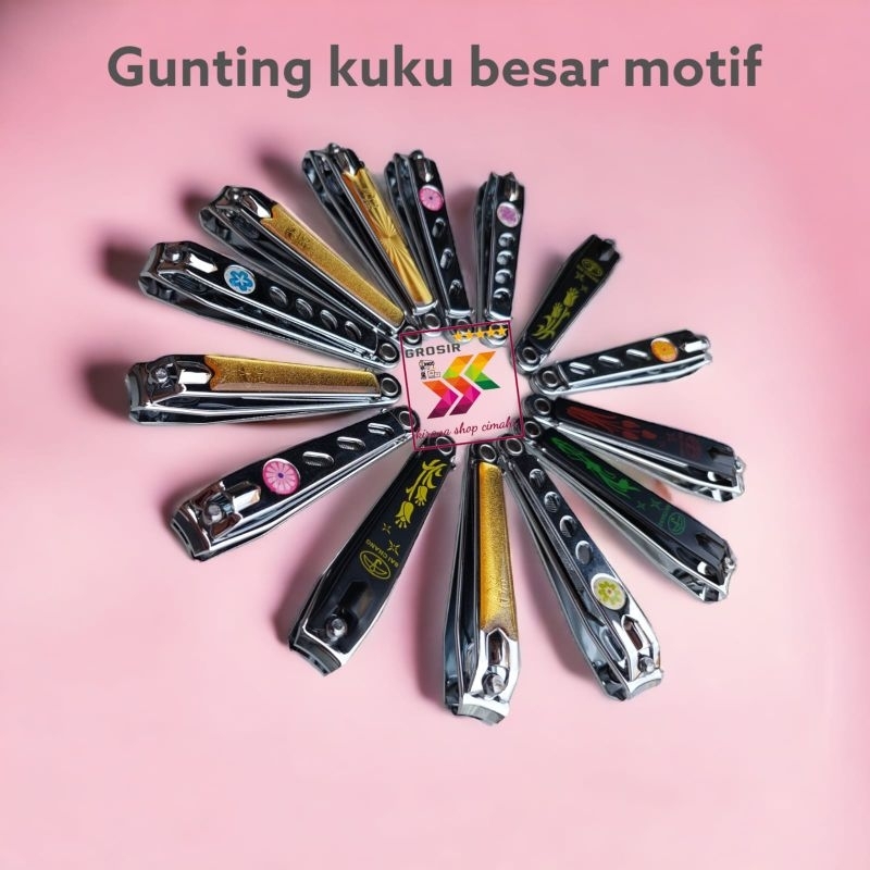 Gunting kuku besar motif