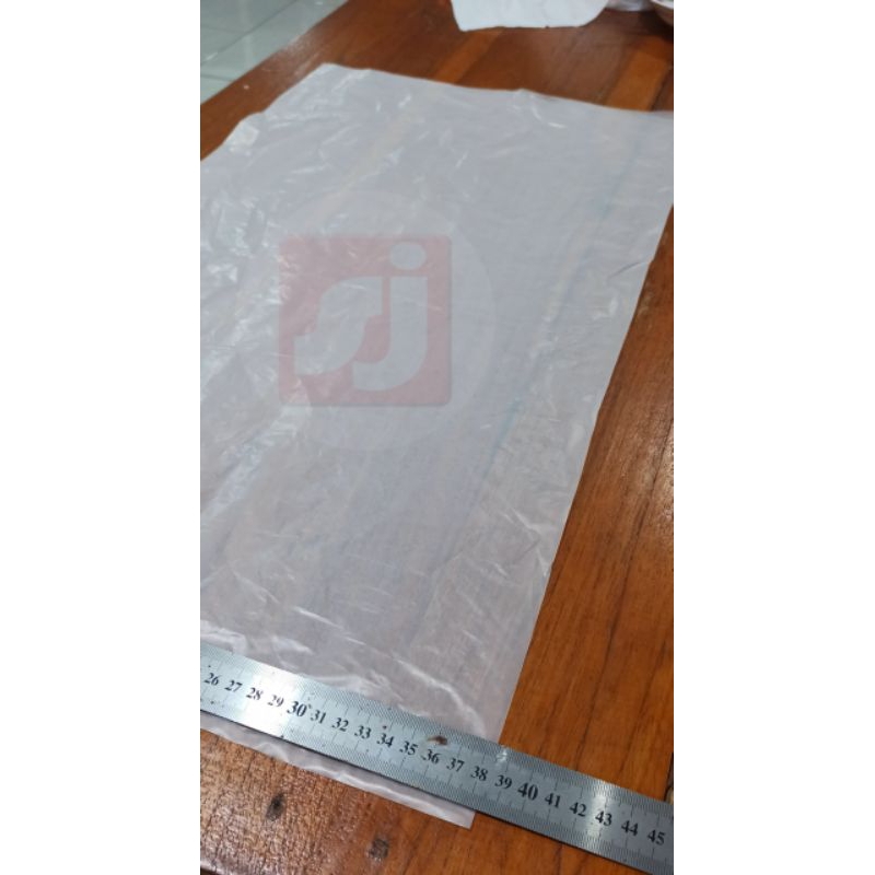 Plastik polos buram tebal (38,5cm x 68cm) Per100Lembar