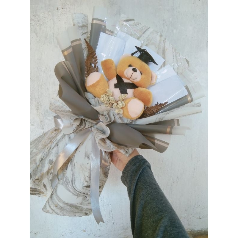 

buket Boneka wisuda dan kosongan 5 lembar