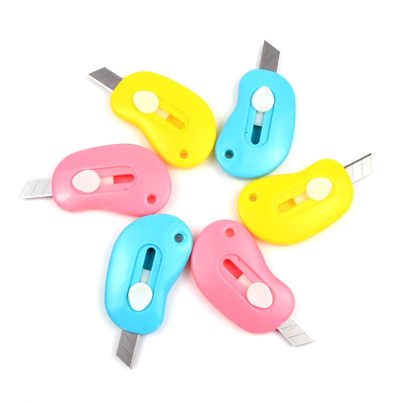 

Cutter Mini Portable Bentuk Oval Mini Cutter Polos Travel Kit Pemotong Kertas Paper Cutter Lucu