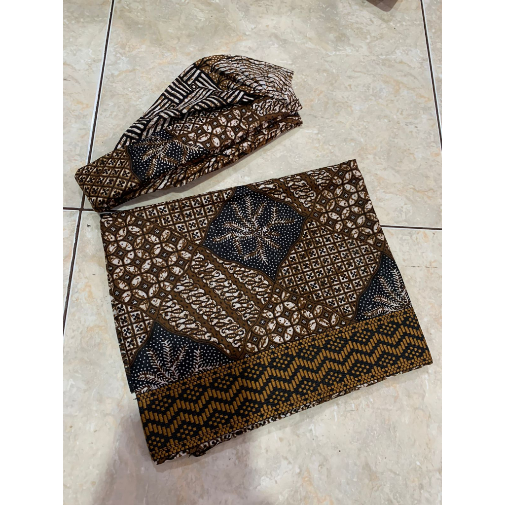 saput dan udeng setengah jadi batik