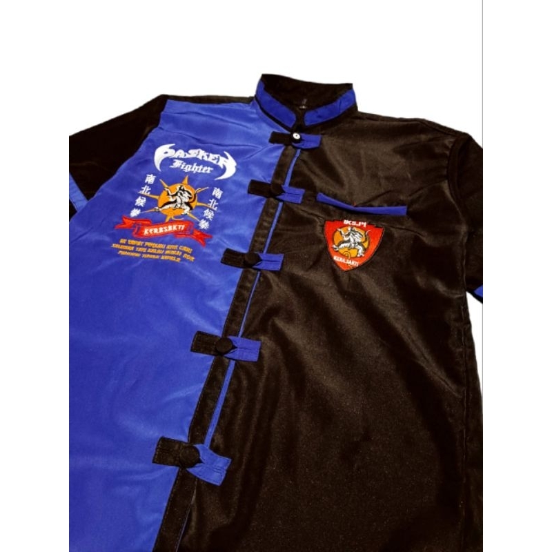 Hem iks.pi kera sakti biru hitam.