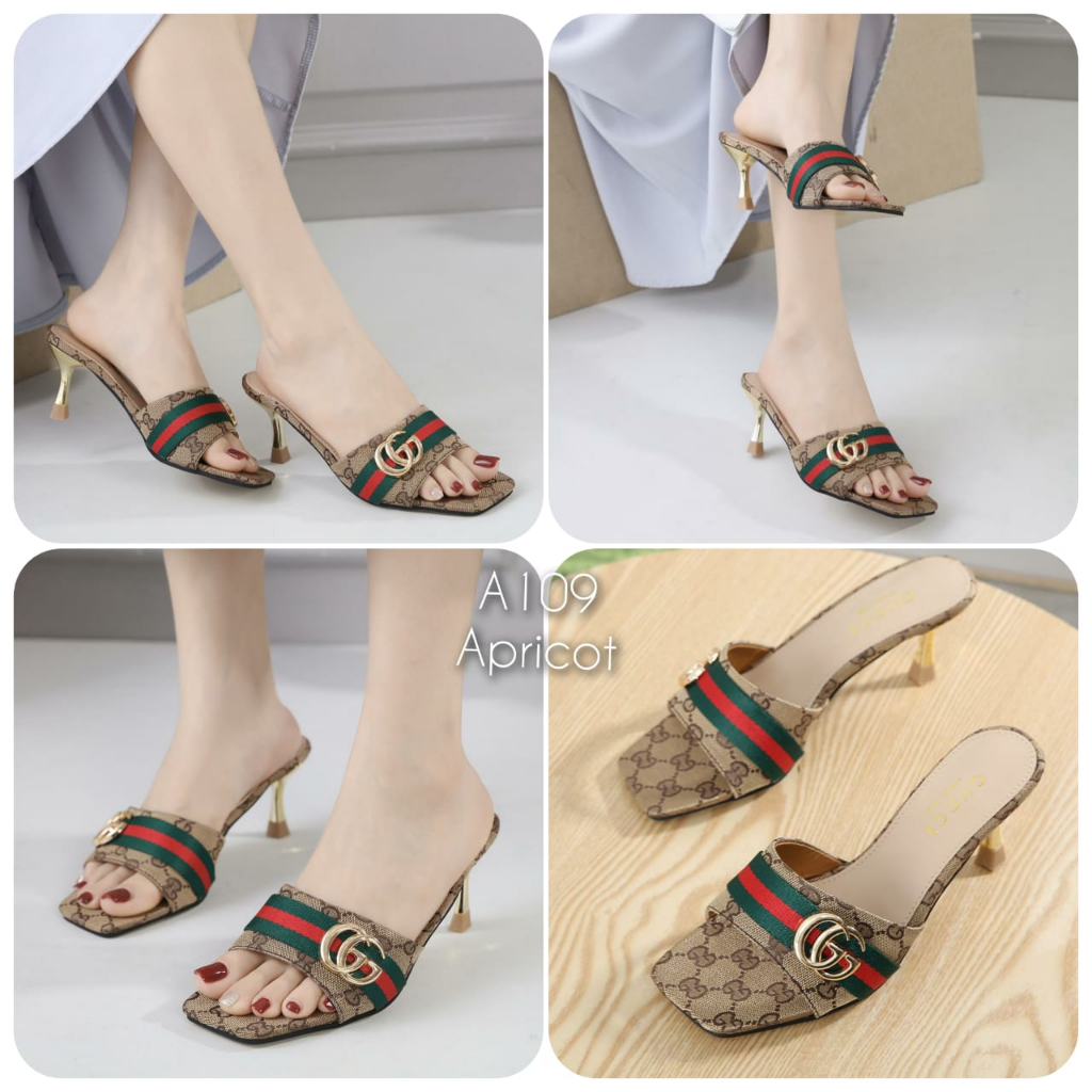 Heel wanita import Canvas logo bee kode A109