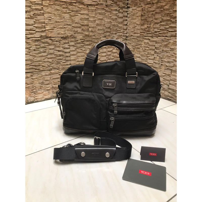 preloved tumi sling bag original