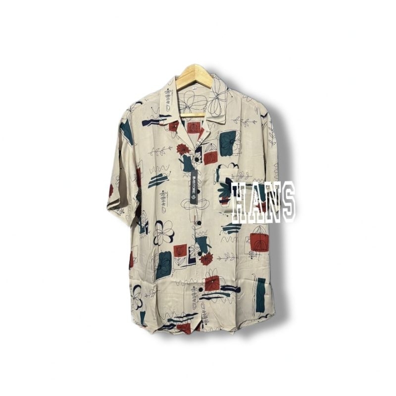 Kemeja lengan pendek hawaiian print