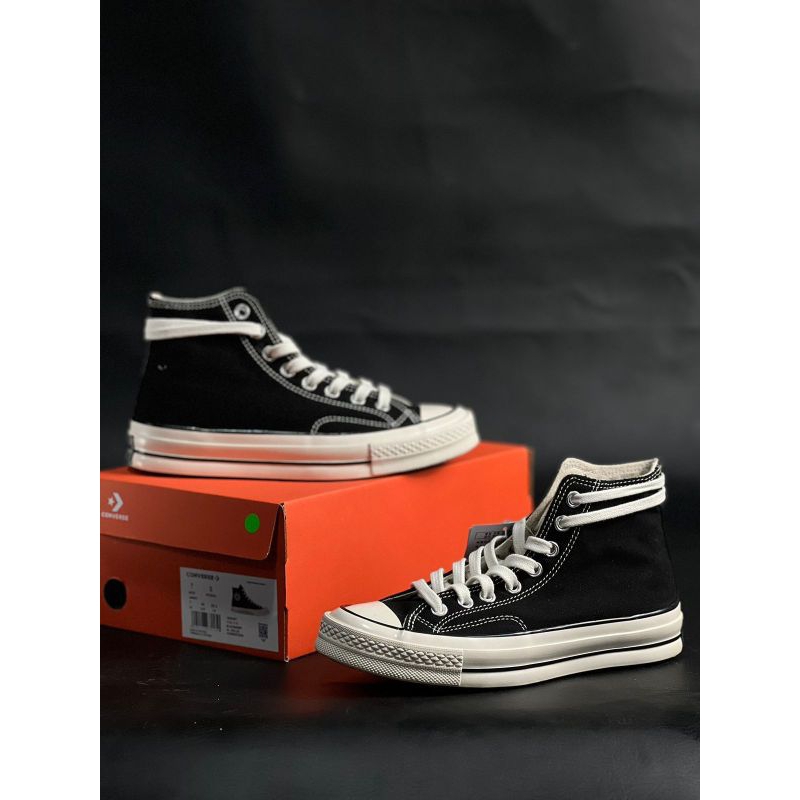 sepatu Converse tinggi