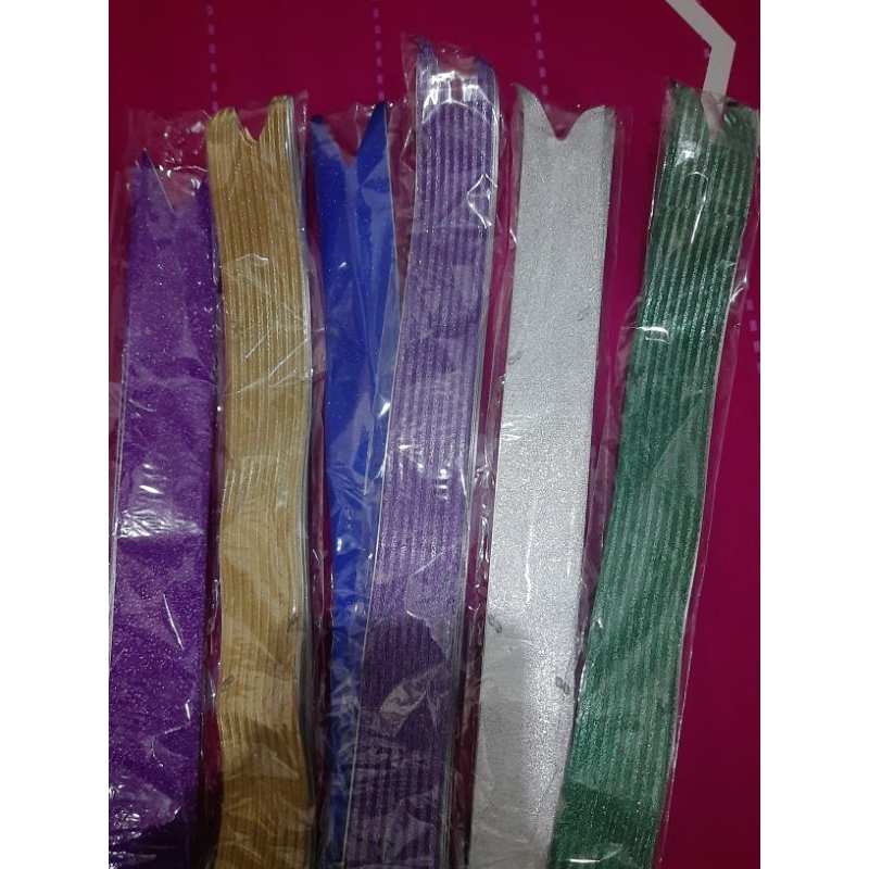 

PAKET 50 PCS PITA TARIK GLITTER 32 mm/PITA SERUT GLITTER HIASAN SOUVENIR