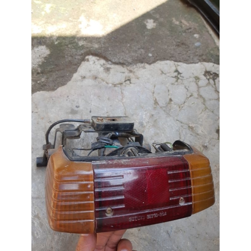lampu belakang stoplamp belakang set breket bracket suzuki rc100 original