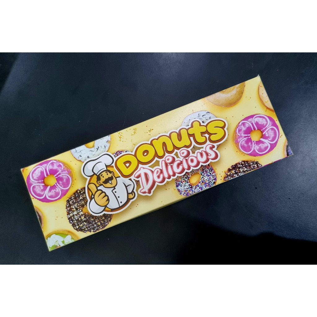 

Kardus / box donat kuning ukuran 27cm x 9cm x 5cm (10 lbr)