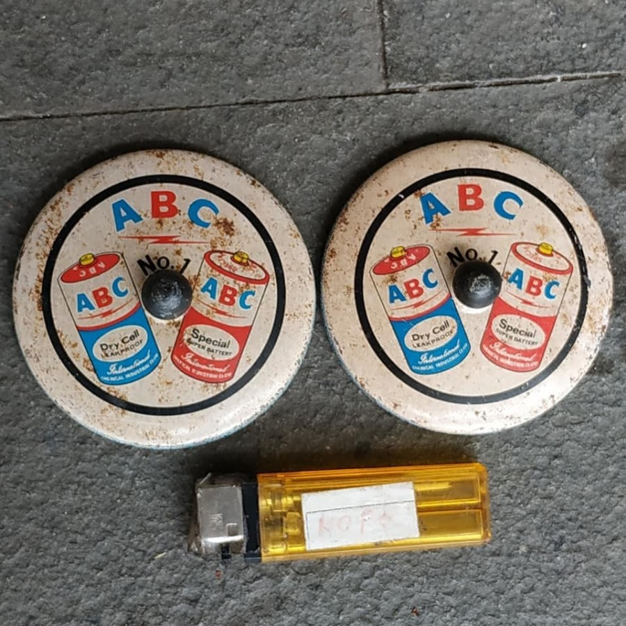 Pajangan Iklan Seng Tutup Gelas Baterai ABC