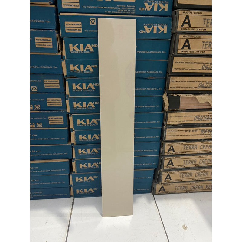 Plin Granit 10x60 Hitam/Cream