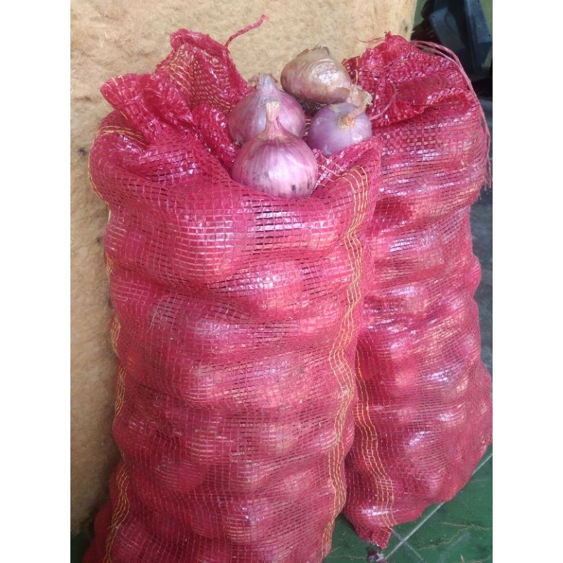 

1 kg bawang merah besar pol hampir rata.