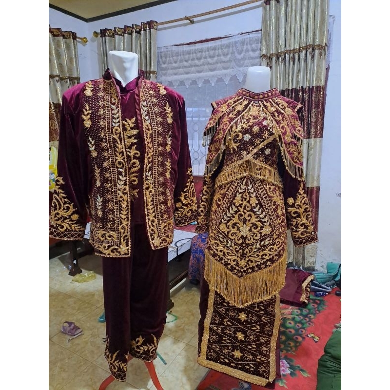 baju penganten minang spasang.