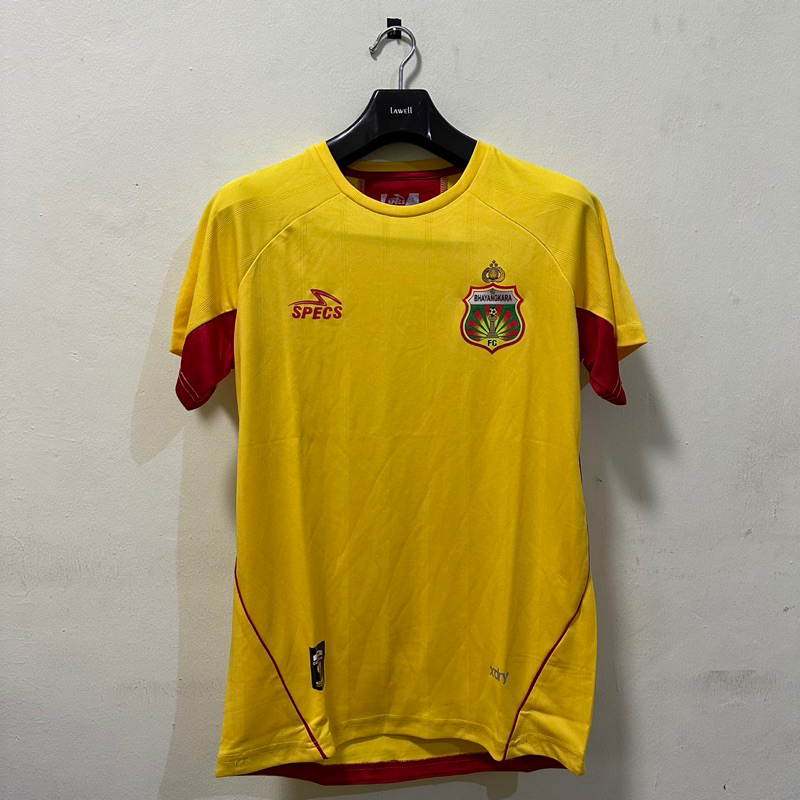 KAOS SPECS BHAYANGKARA FC HOME (YELLOW/RED PAPRIKA)