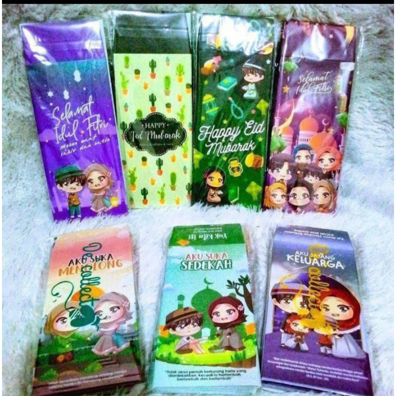 

AMPLOP LEBARAN motif uang karakter random isi 10 dan 50 ready