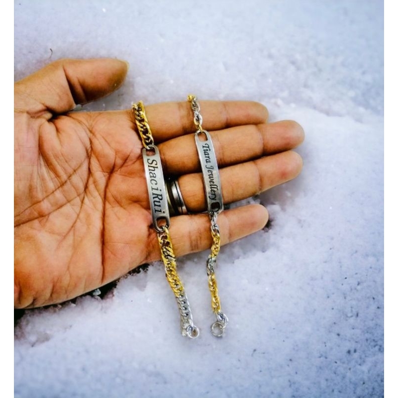 gelang titanium grafir nama
