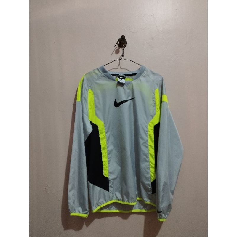 baju olahraga Nike