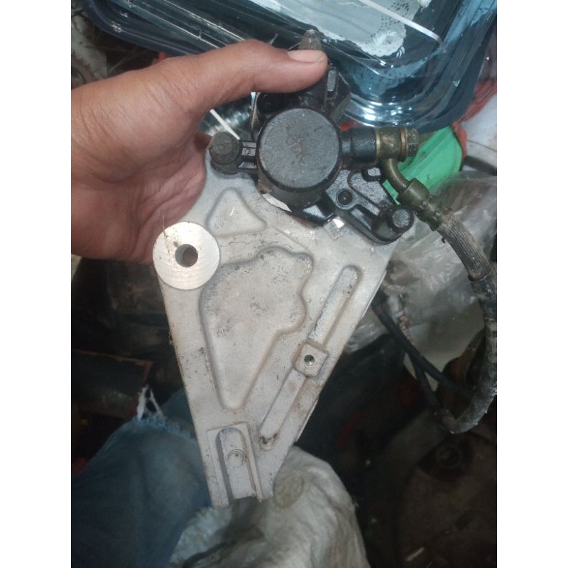 kaliper pengereman belakang Supra 125
