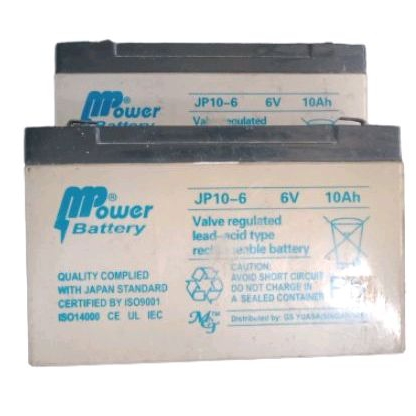 aki bekas mobil mainan