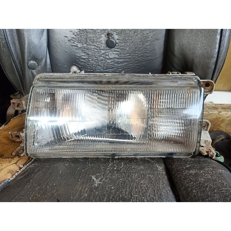 headlamp kiri ford laser GL