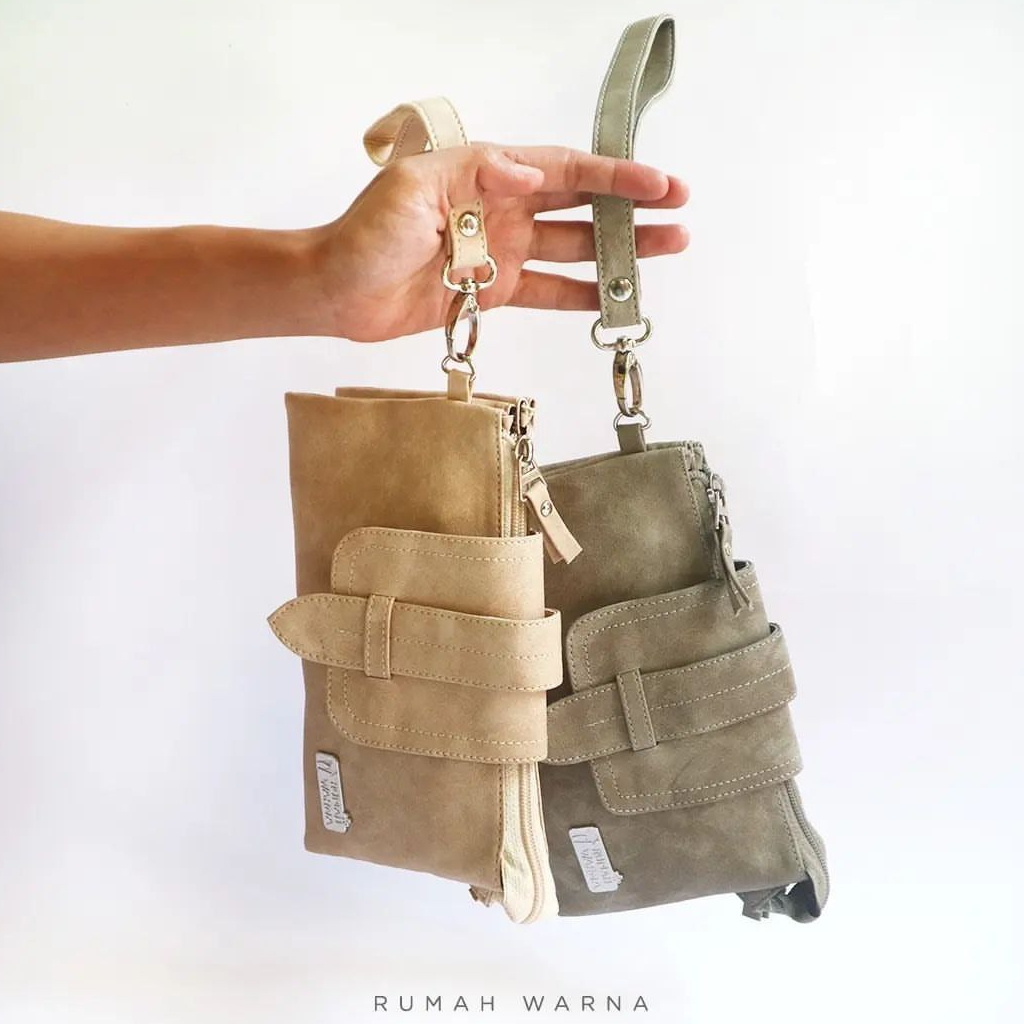 DOMPET NURA RUMAH WARNA