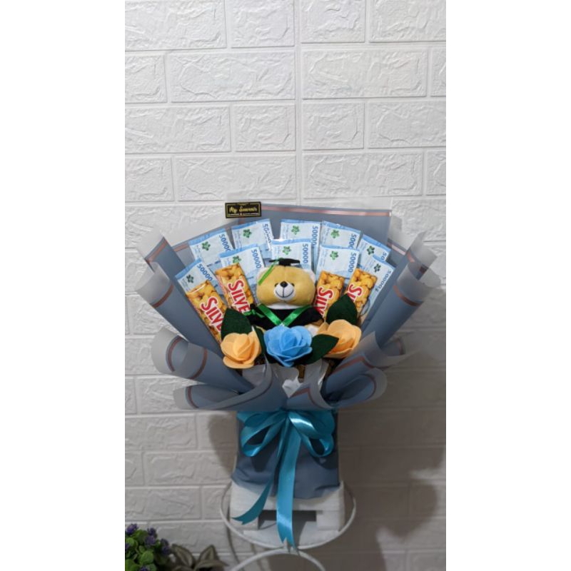 

Buket boneka dan uang