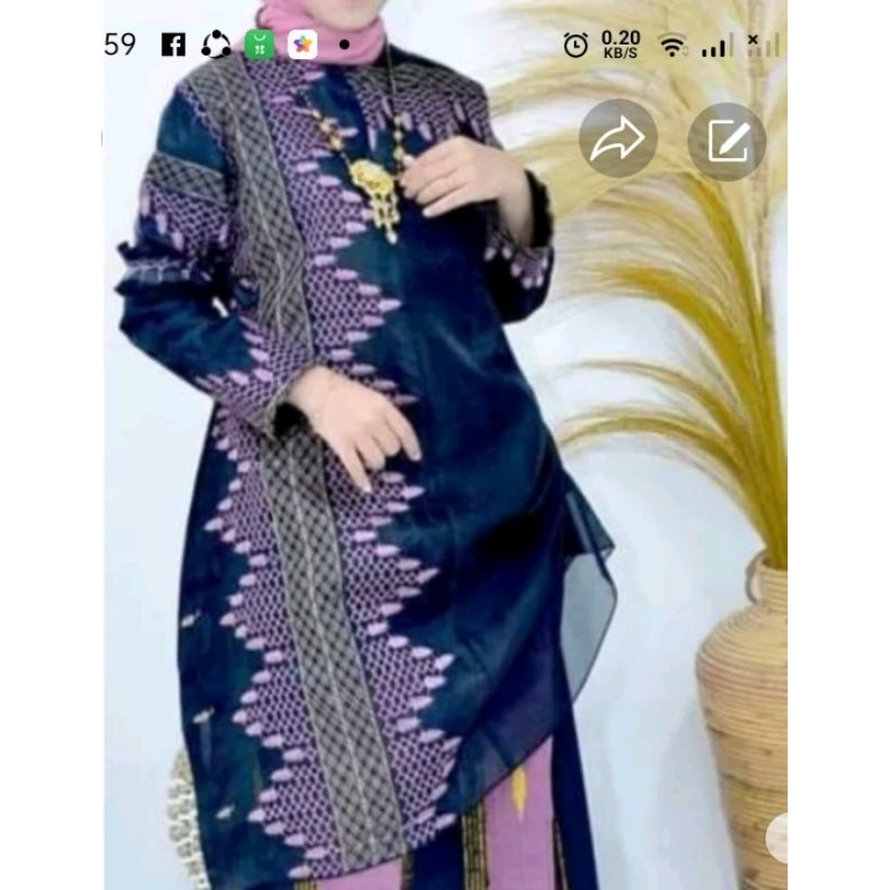 Baju bodo modern (baju dengan sarung)