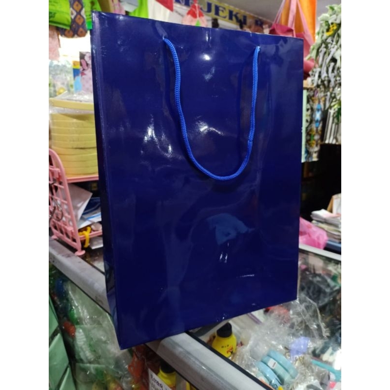 

paper bag polio biru Dongker bahan tebal isi 12 pcs terlaris dan termurah