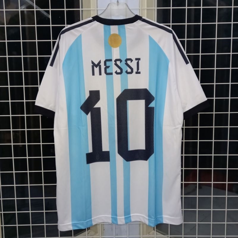 JERSEY ARGENTINA HOME 2022/2023 NNS MESSI WITH PATCH GOLD FIFA WORLD CUP 2022