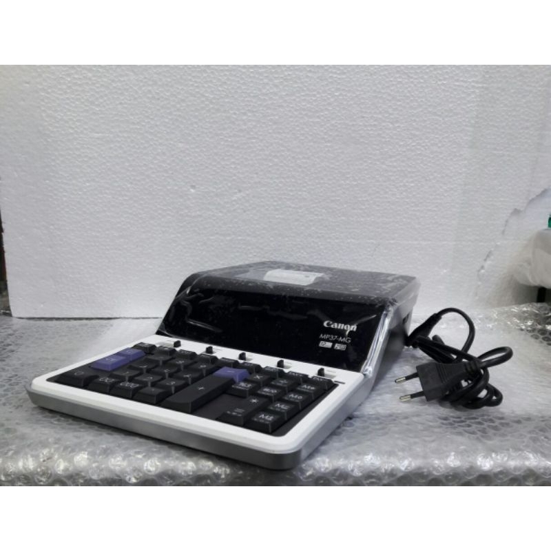 

CANON KALKULATOR PRINT MP 37 MG 12 DIGIT PRINTING CALCULATOR