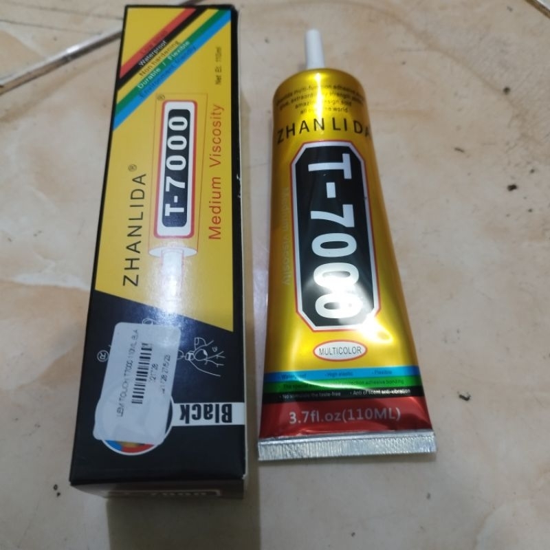 LEM LCD HP CASING T7000 110 ML HITAM MERK ZHANLIDA