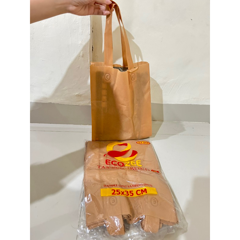 

GOODIE BAG/ HANDLE LIPAT SAMPING/ TAS SPUNBOND / TOTEBAG 25x35x8(HLS)