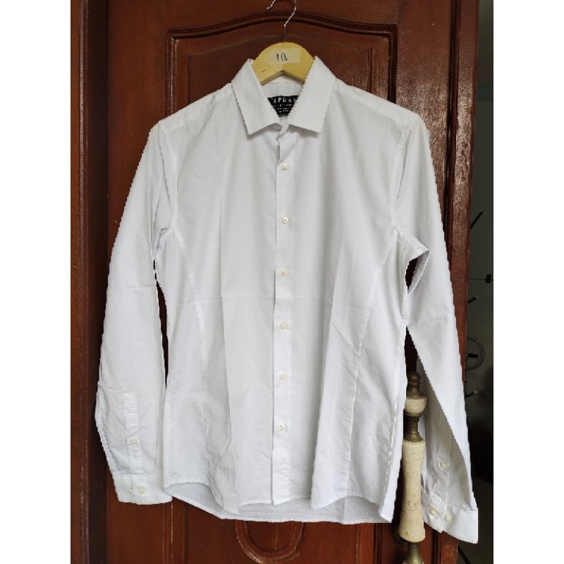 kemeja putih topman