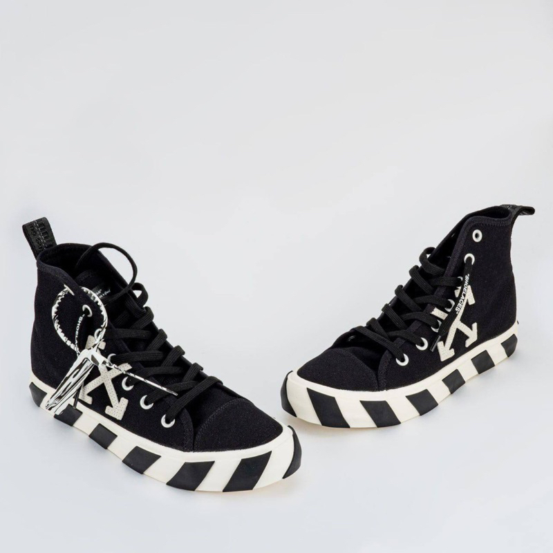 Off White Vulcanized Mid Top Sneakers