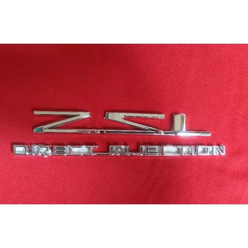 Emblem Logo 2.5 L Direct Injection Panther 2.5 L