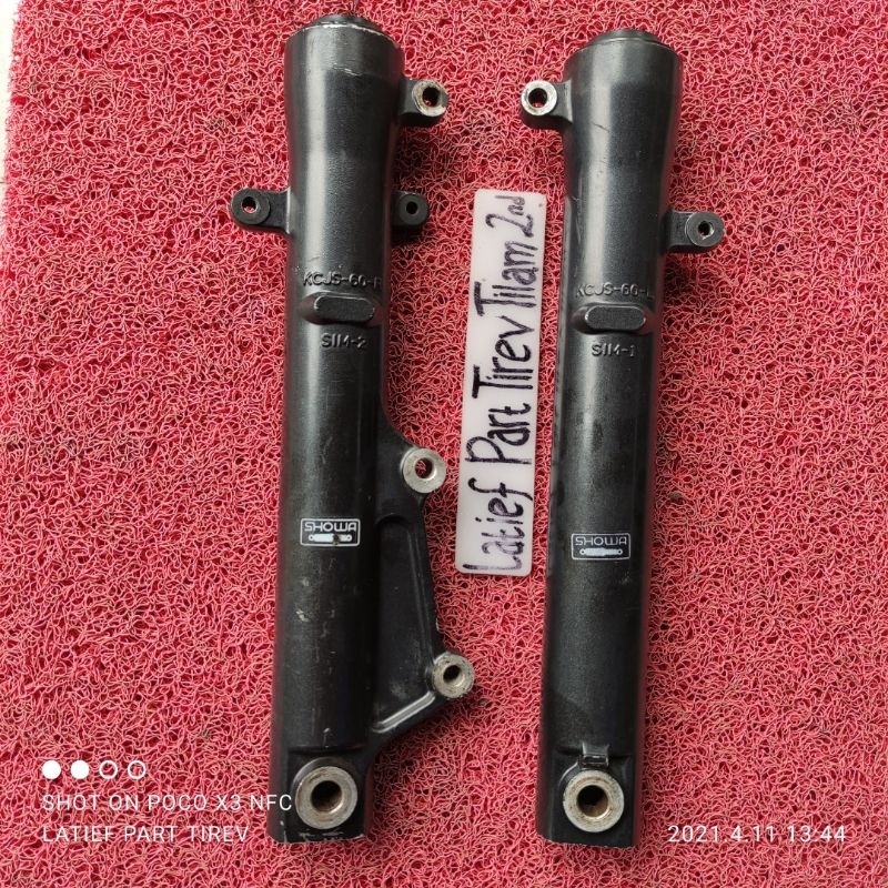 buttom shock depan tiger revo original