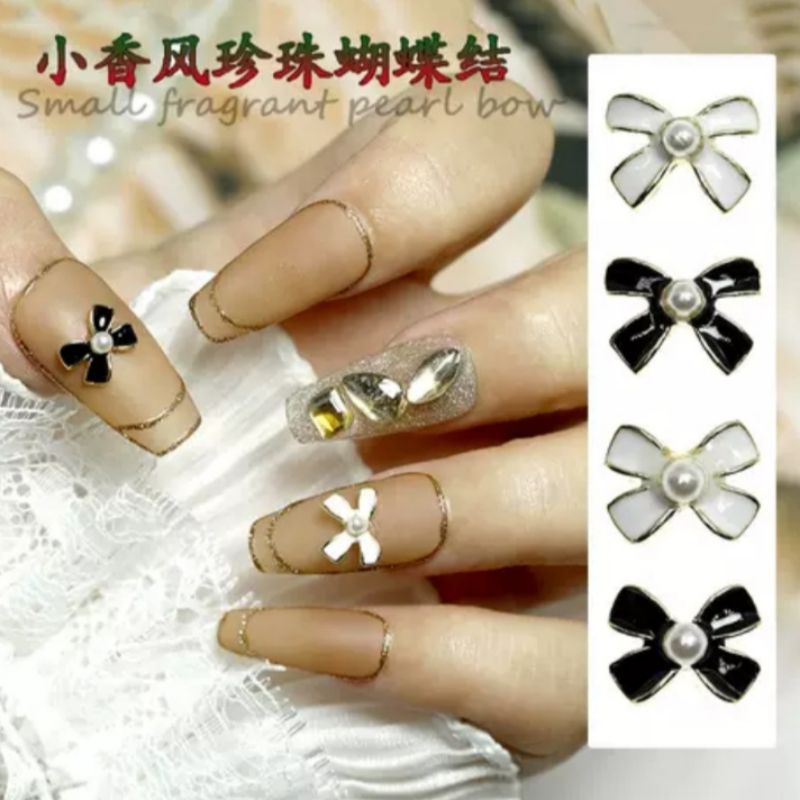 Hiasan bentuk Pita untuk dekorasi Nail Arts isi 12pcs mixed