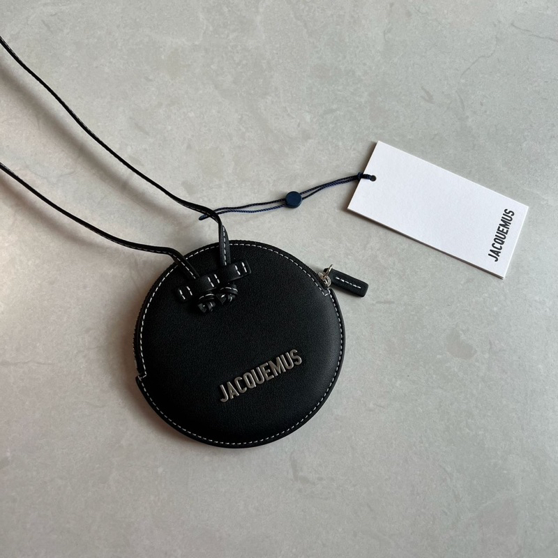 Jacquemus le pitchou mini round bag in black white stitch shw