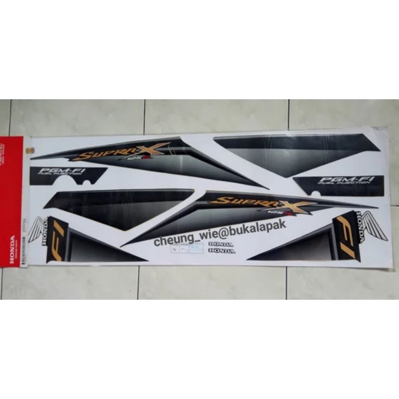 871X0KVLN50ZC Lis body/ striping / stiker Honda Supra X 125 PGM- F1 2009 Gorg Blue injeksi asli ori 