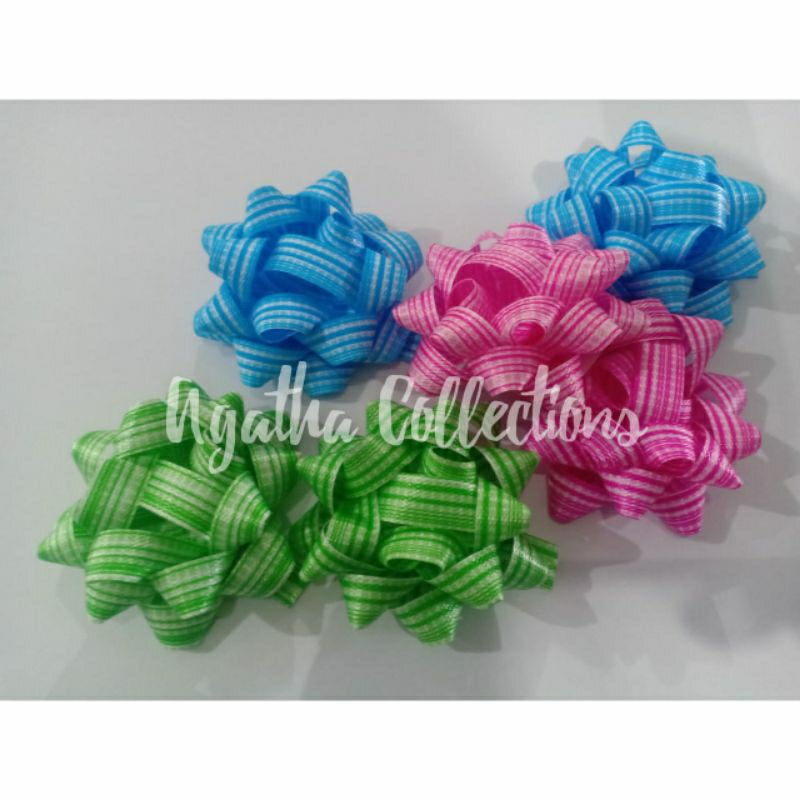 

Pita hias/ pita kertas bergaris /pita bentuk bunga timbul ukuran 6cm per 2 biji