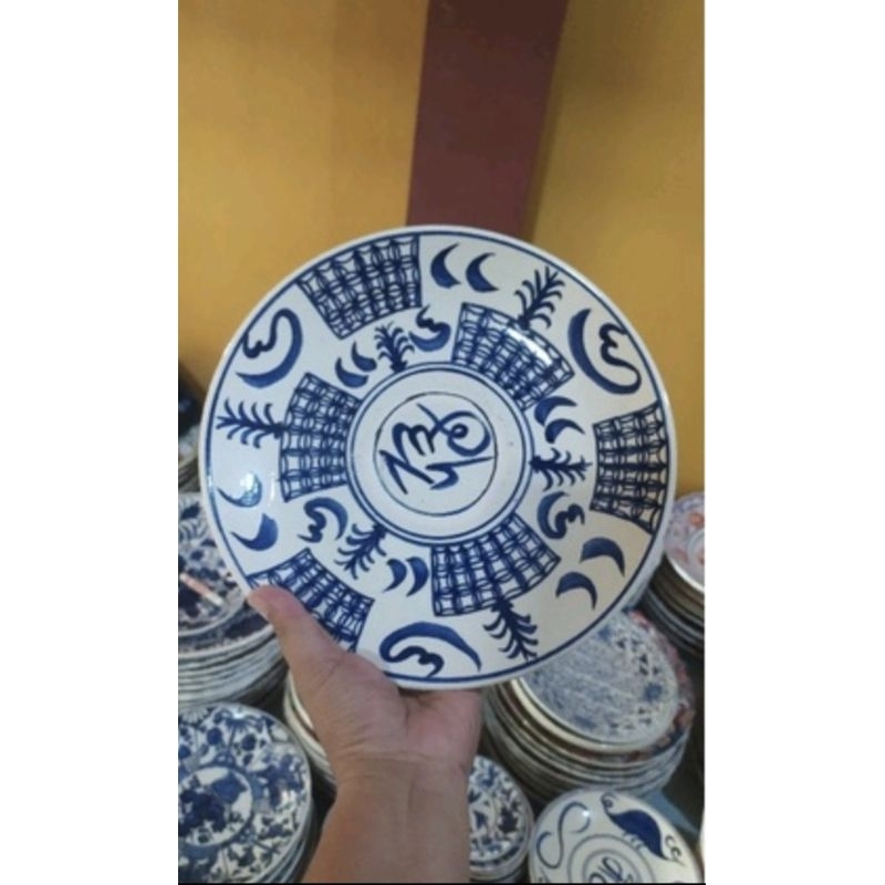 piring keramik lukis motif batu