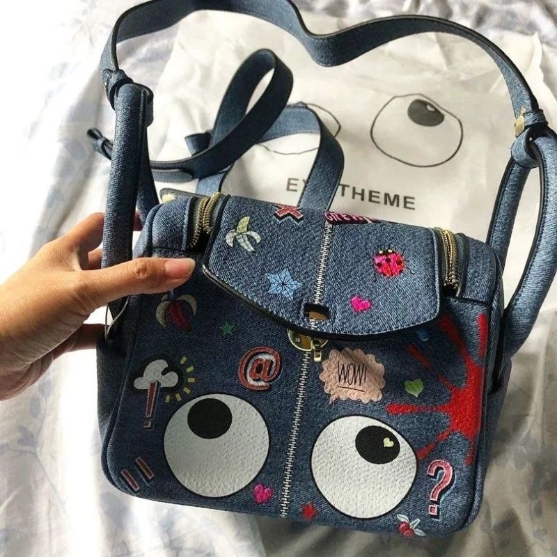 H*UER EYE THEME BAG : Breetya Eye Theme Printed Bucket Bag